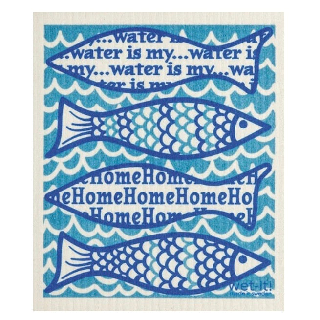 ivory colored rectangle shaped scrubbing pad with a fun bright blue pattern of a water waves background and 4 large patterned fish on top of the wave background screen printed on it