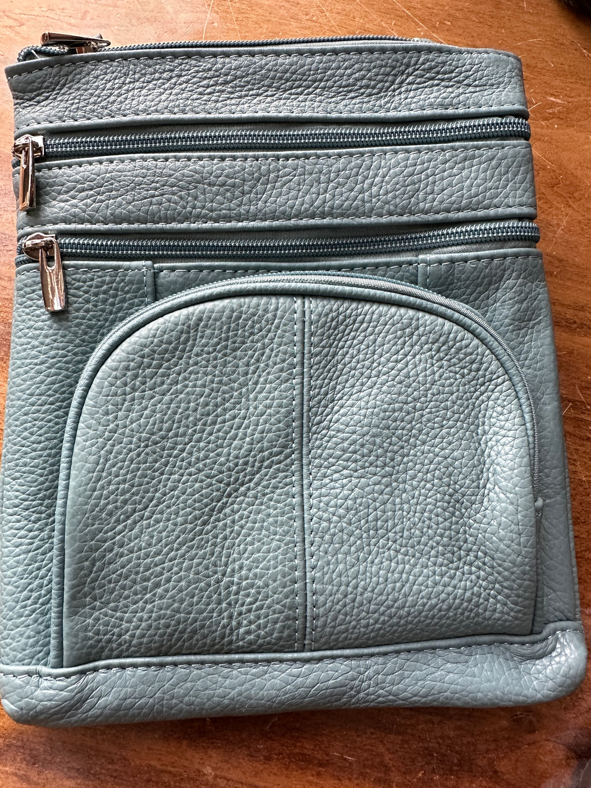 Leather crossbody on the go bag