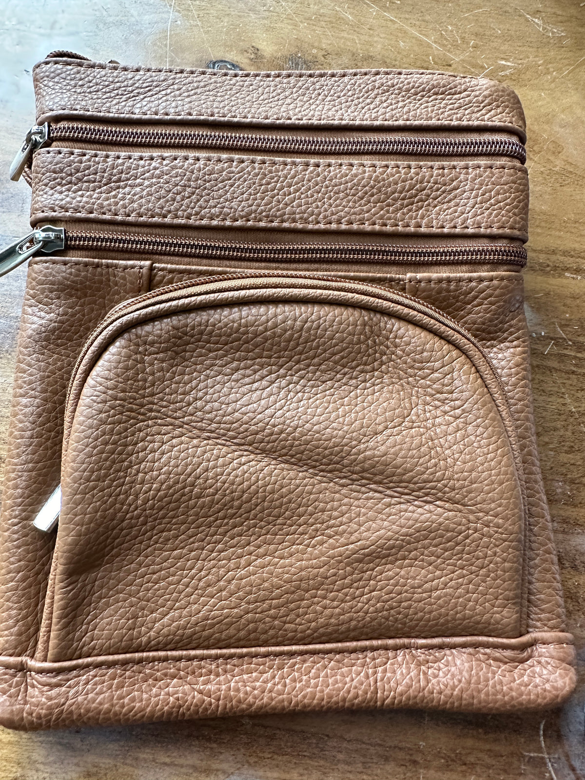 Leather crossbody on the go bag