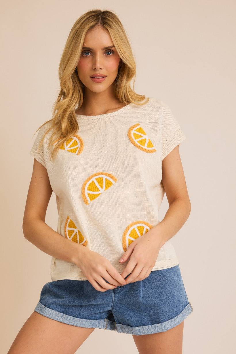 Cream Sleeveless Orange Patch Knit Top