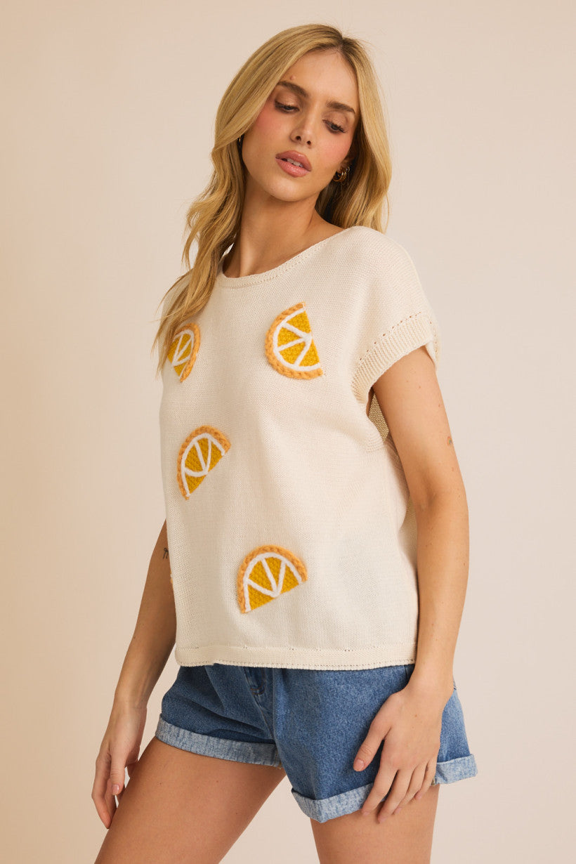 Cream Sleeveless Orange Patch Knit Top