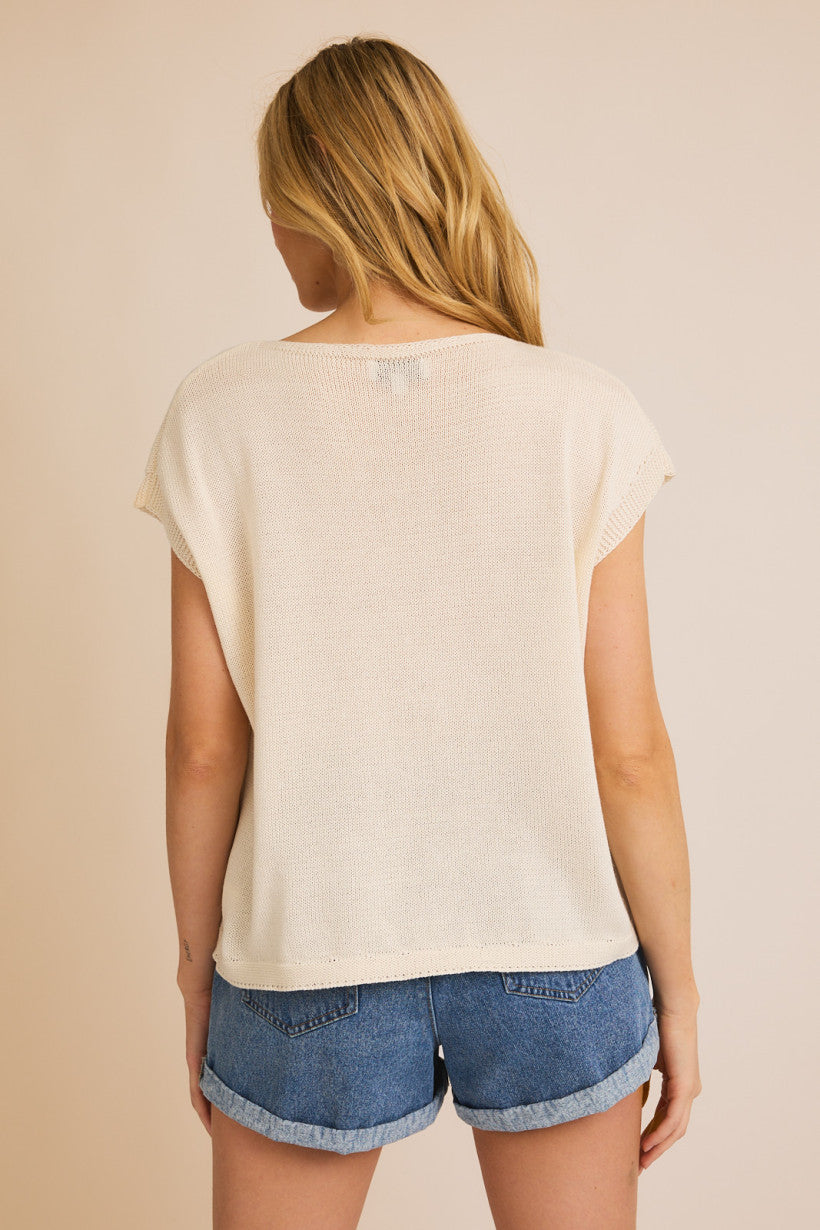 Cream Sleeveless Orange Patch Knit Top