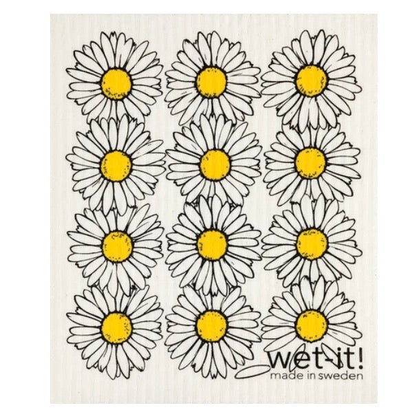ivory colored rectangle shaped scrubbing pad with 3 repeating columns of 4 big white daisies each for a total of 12 daisies screen printed on it