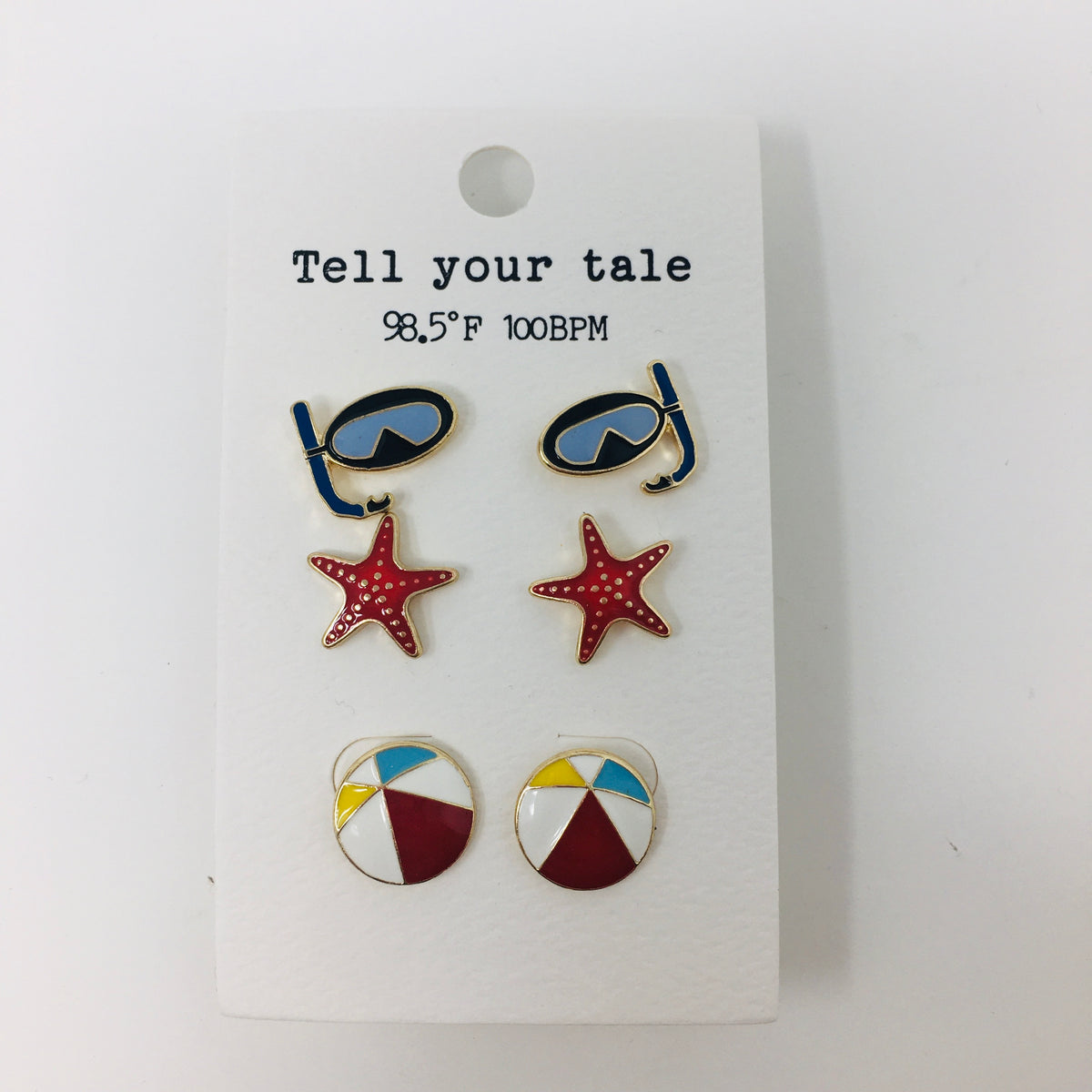 Set of 3 enamel colored post earrings on an ivory backer card showing black swim goggles and snorkel, orange starfish, and multicolored beach balls, 