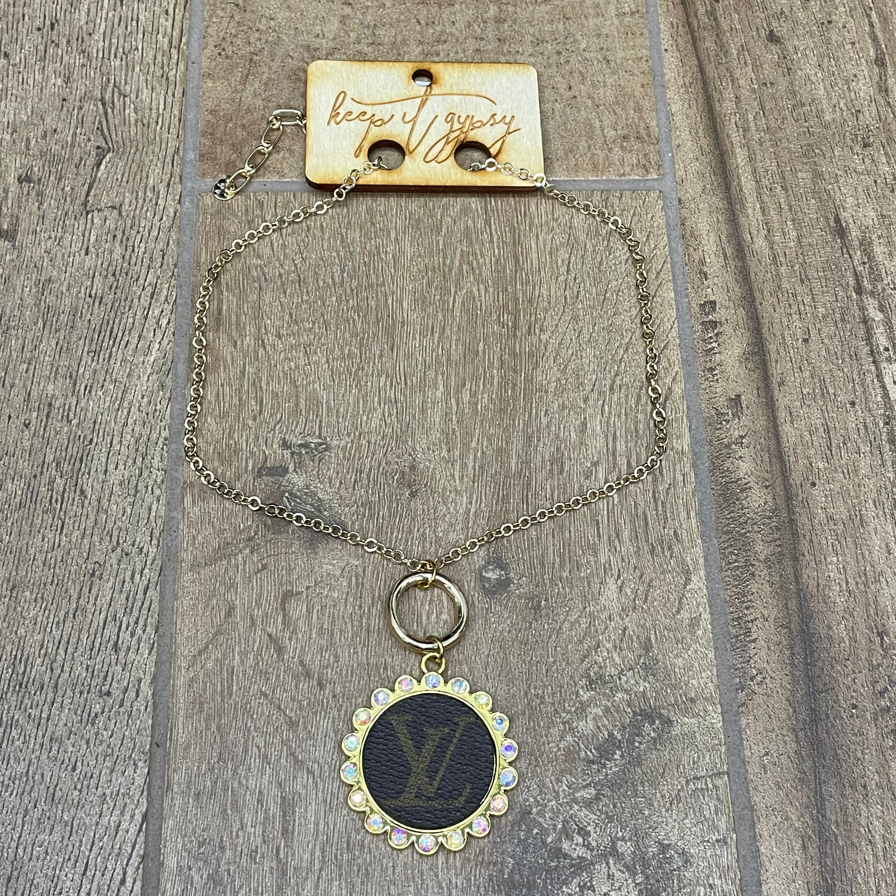 Gypsy LV Gold Necklace w/ Loop Holding Emblem