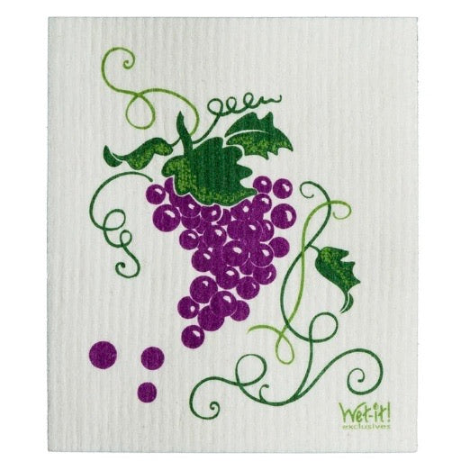 ivory colored rectangle shaped scrubbing pad with a cluster of purple grapes and green grape vines around the cluster screen printed on it