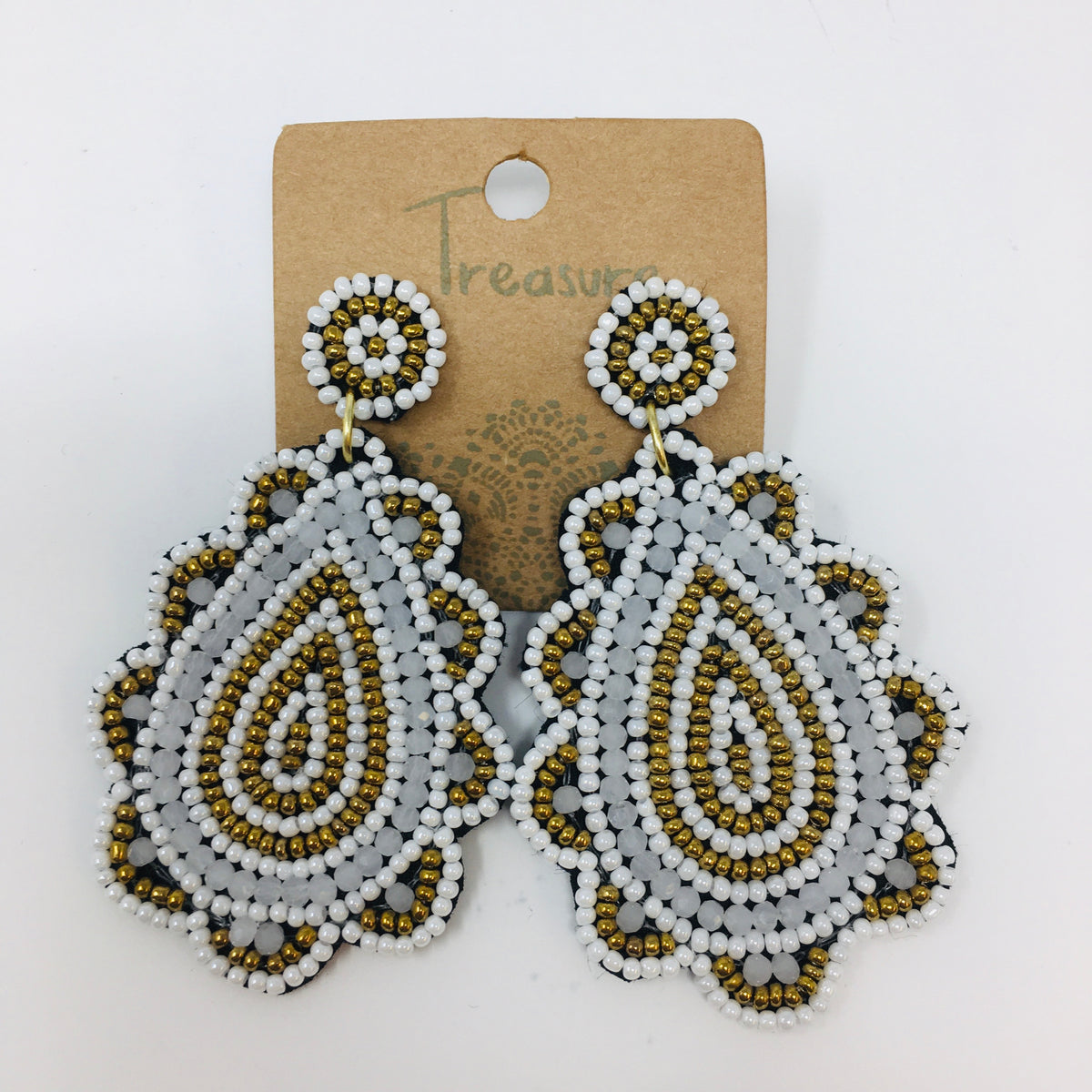 Scalloped teardrop shaped earrings with gold &amp; white colored seed beads shown on white background