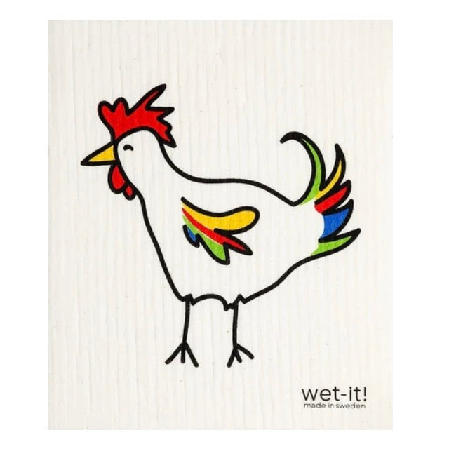 ivory colored rectangle shaped scrubbing pad with a white rooster with multi colored feathers screen printed on it