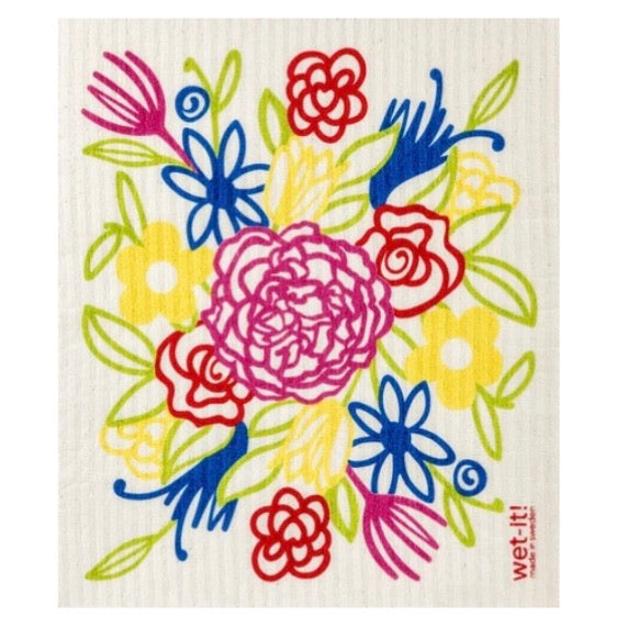 ivory colored rectangle shaped scrubbing pad with a colorful artsy look of hand drawn flowers in blue, yellow, green, red, and bright pink screen printed on it