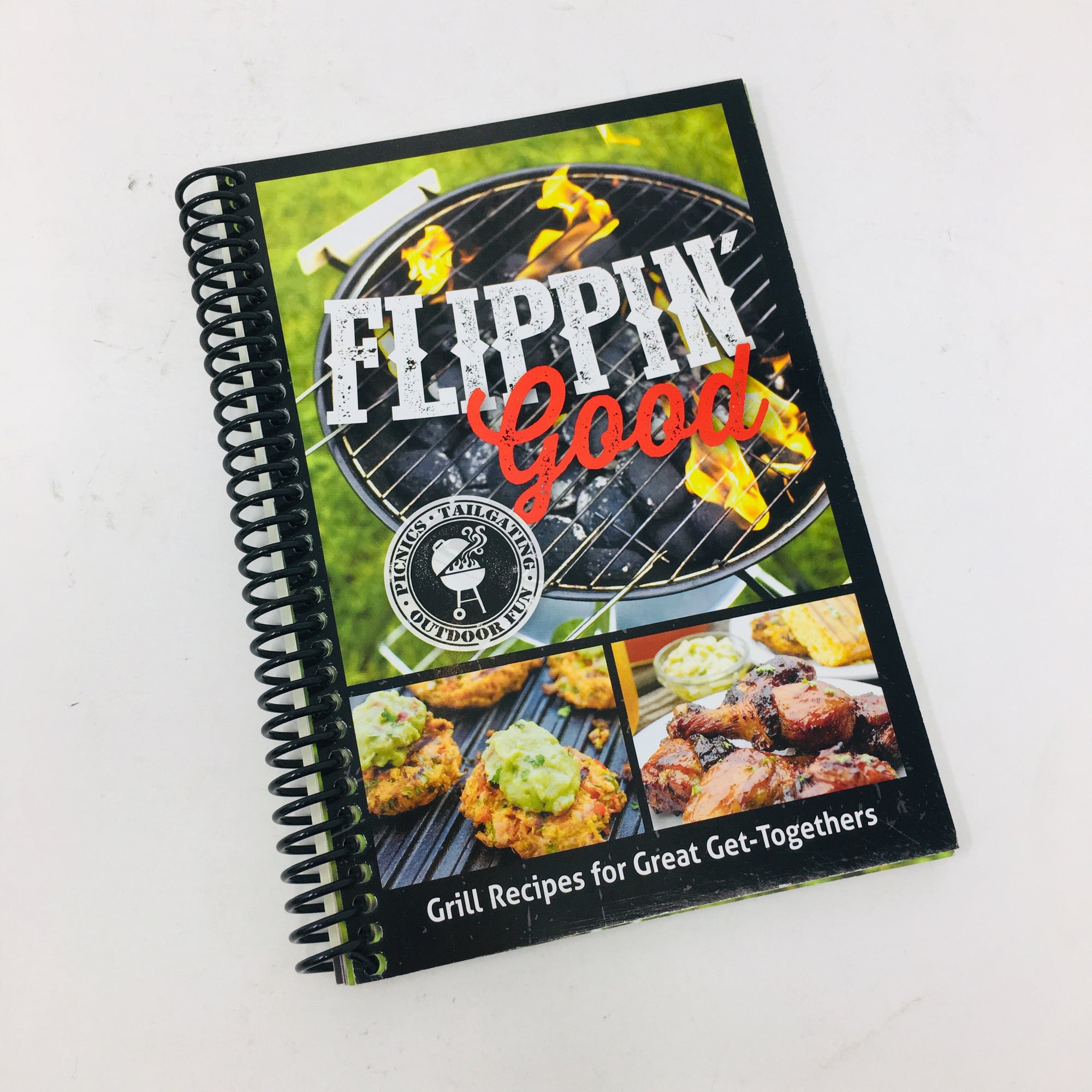 front cover of the spiral bound Flippin' Good cookbook