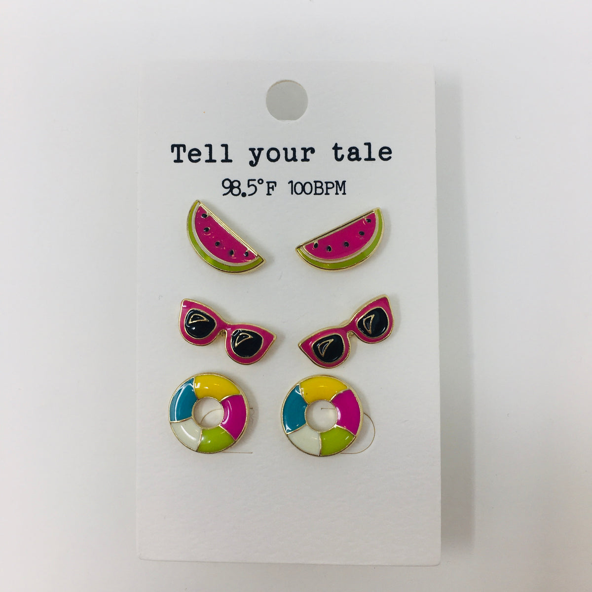 Set of 3 enamel colored post earrings on an ivory backer card showing pink watermelon slices, pink sunglasses, bright colored swim rings